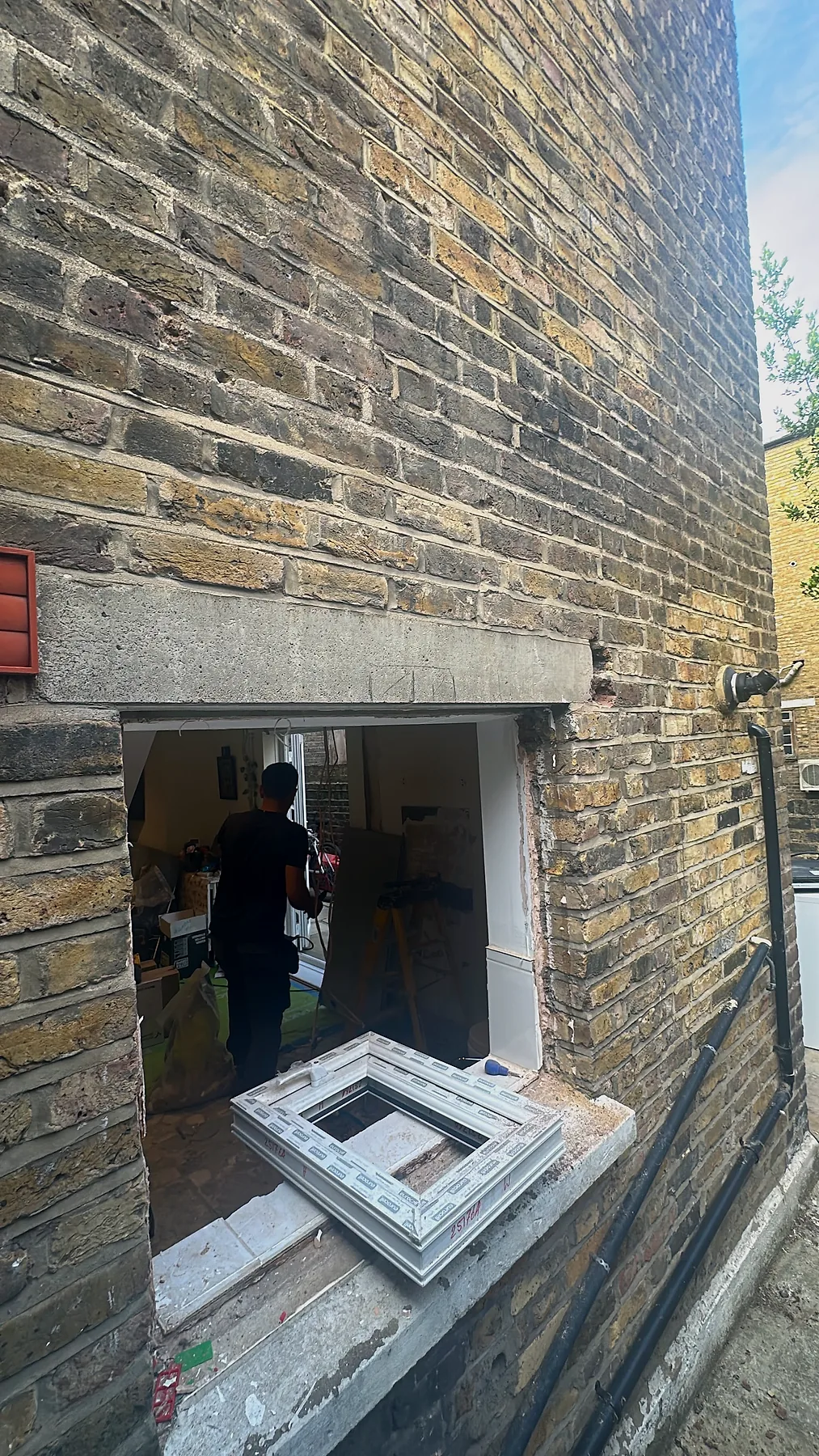 Gulf Builder preparing a new structural opening for a kitchen renovation