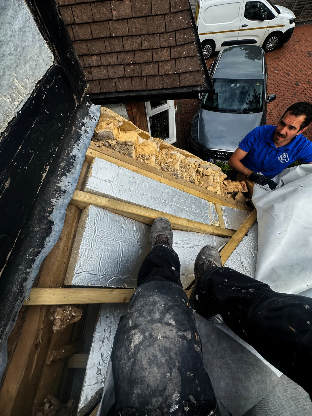 Gulf Builder team upgrading a garage roof in Leatherhead